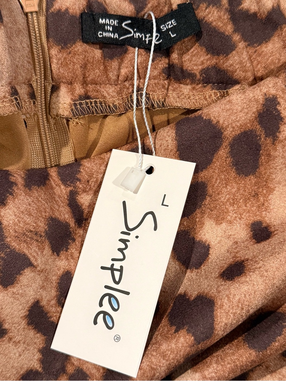 Simple Leopard Print Mini Skirt in Tan and Black - Picture 3 of 4